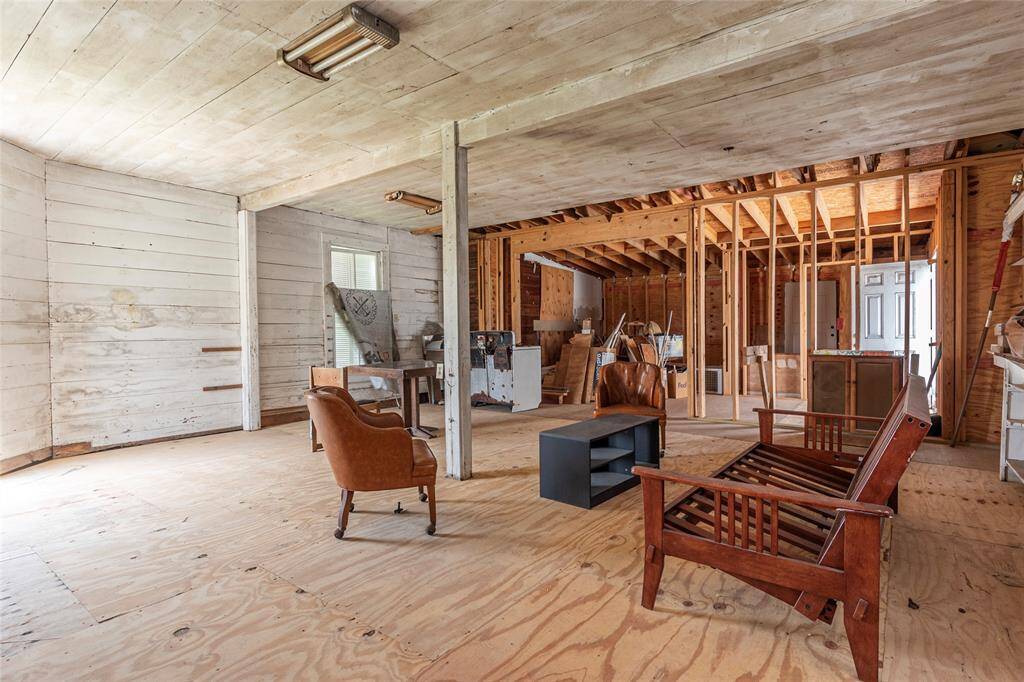 The unfinished 37'x23' building has some infrastructure started to become a bath and kitchen area.