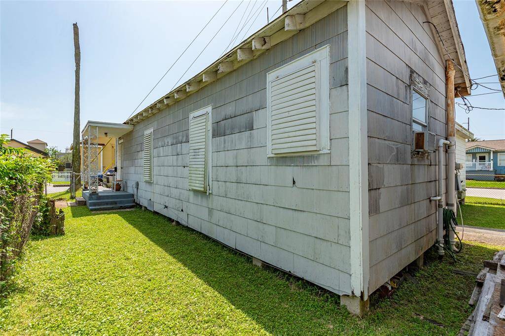 This is a view of the home to show the entrance area and shuttered window covers.