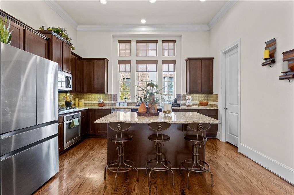 Gourmet kitchen with large island and seating.