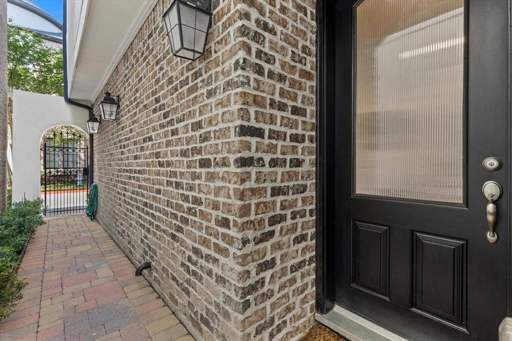 Paved walkway to front door, or continue on to your outdoor living area. A feature unique to this beautiful home.
