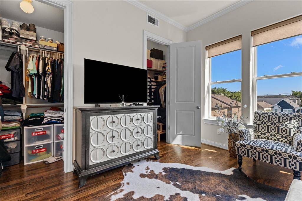 Two walk in closets in primary bedroom, third and largest closet in bathroom.