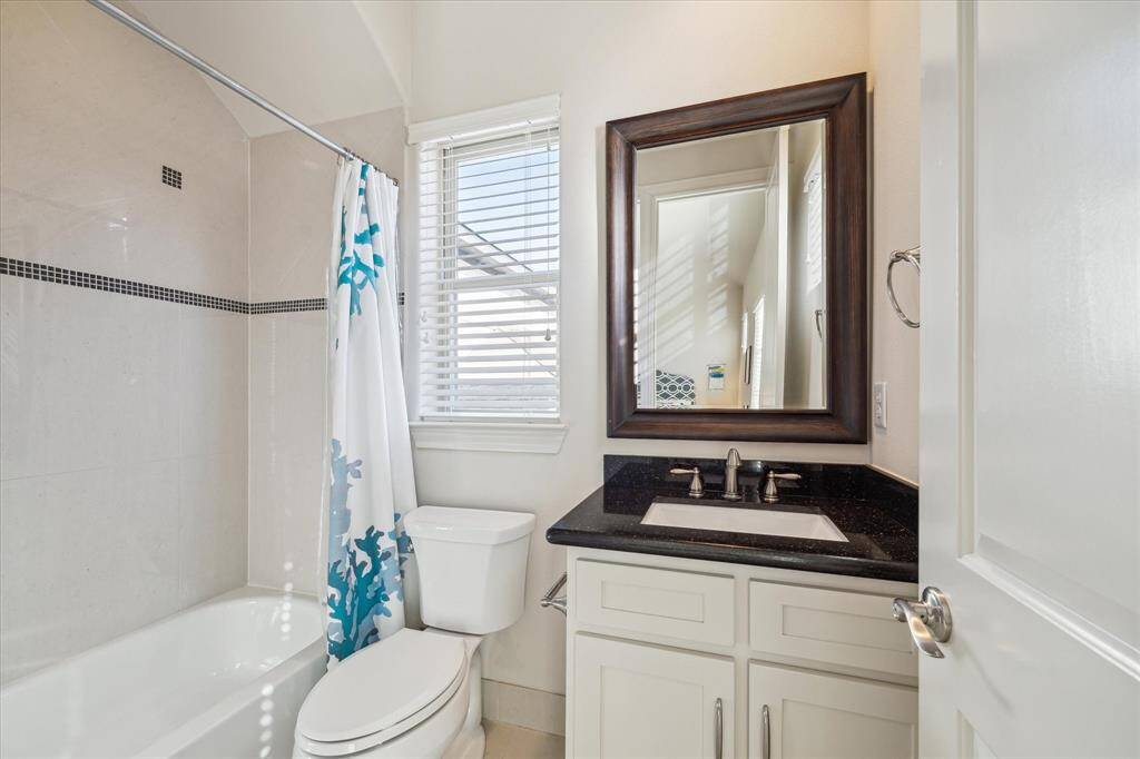 3rd floor en suite secondary bedroom bath.  With tub/shower combo