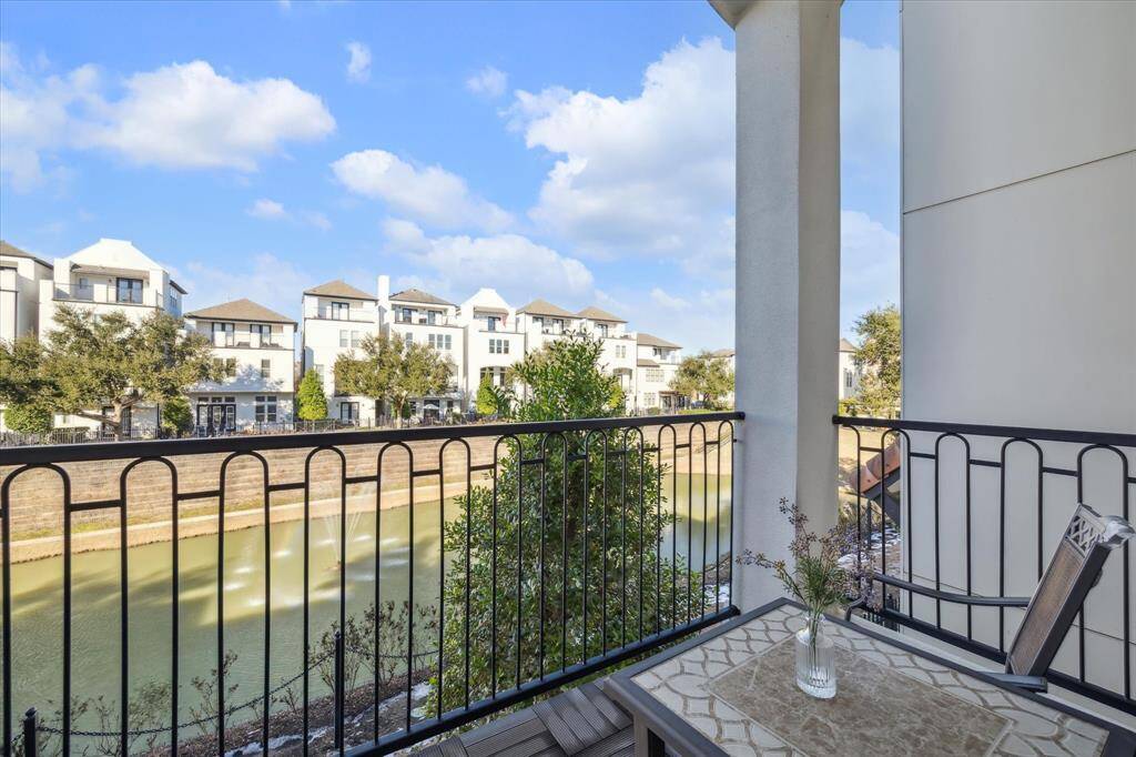 2nd floor balcony off the living room with beautiful views of the pond
