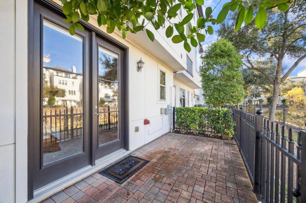 Charming patio off of the secondary bedroom on first floor.
