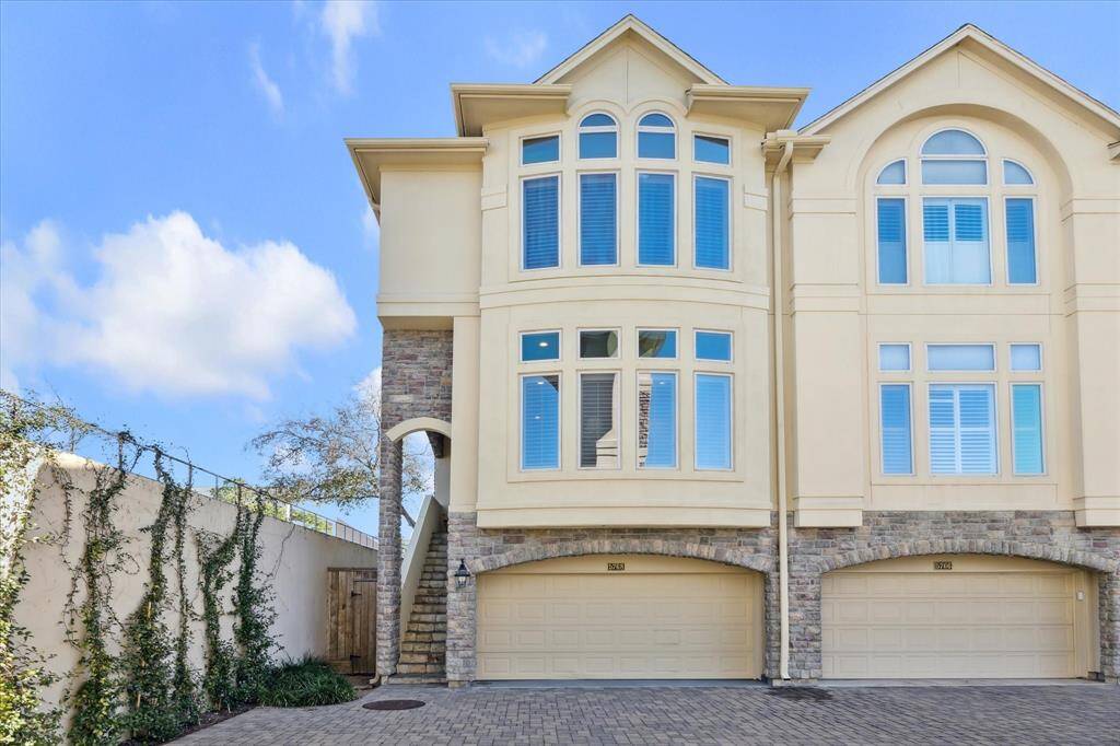 Townhome offers a double garage and elevator accessibility.