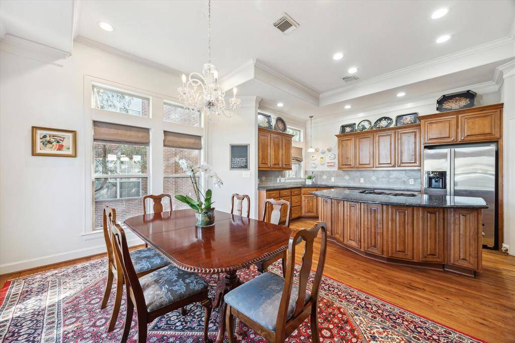 Dining room off kitchen offers a great area to showcase a beautiful dining table with tons of natural light, located on 2nd floor.