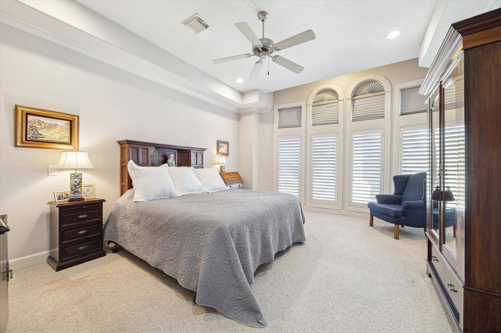 Spacious primary bedroom with lots of natural light, located on 3rd floor.