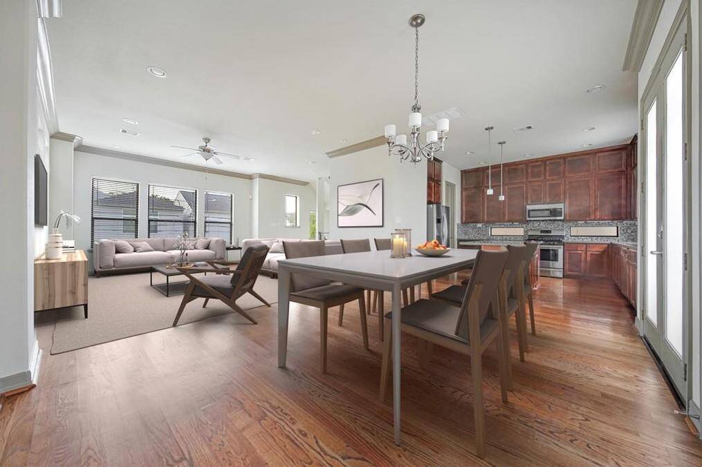 View of dining room. Virtually staged.