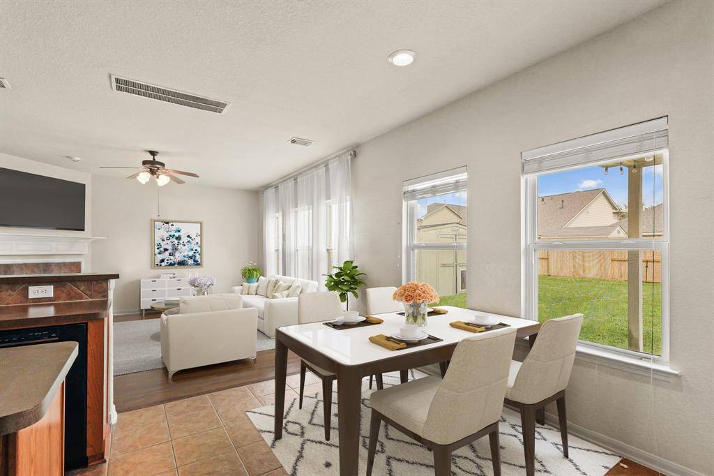 Virtually Staged: The large windows will allow plenty of natural light throughout the day.