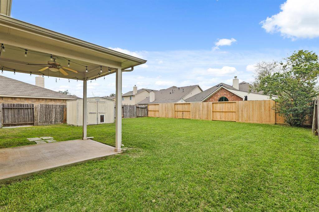 This HUGE backyard is definitely not lacking on green space!