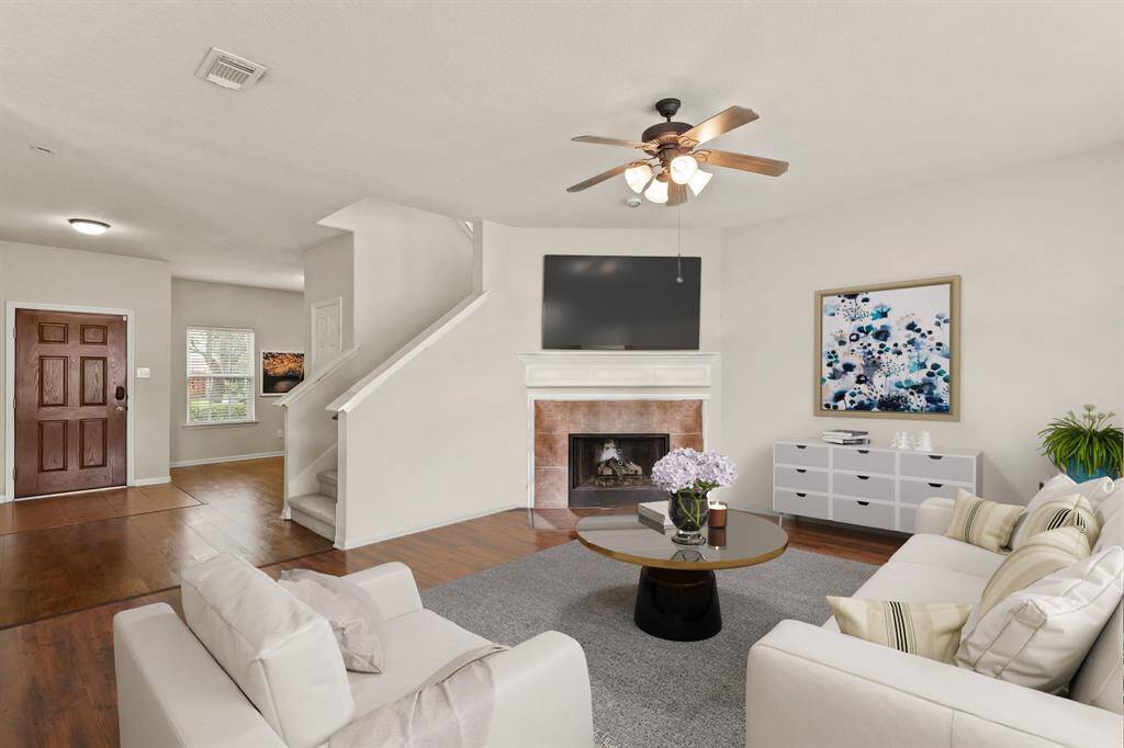 Virtually Staged: Walk through the foyer past the staircase and arrive at this incredible living room.