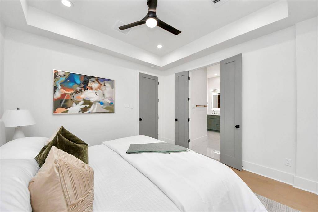 Enter through the double doors into your grand bathroom, where numerous luxurious upgrades await you.