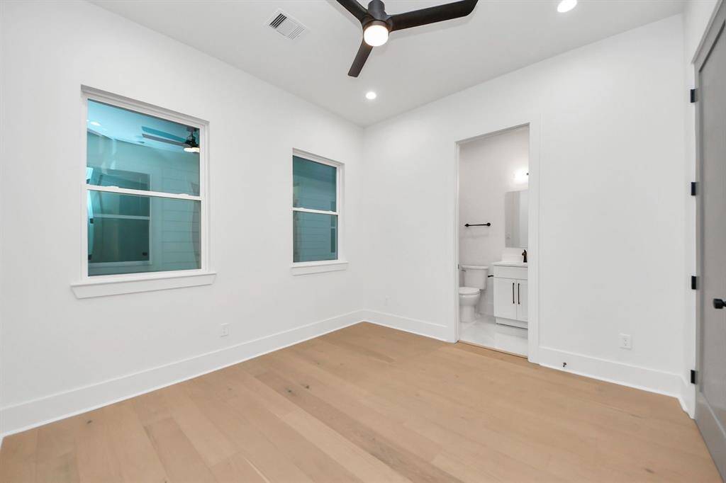 Bedroom 3 features an innovative design that maximizes space, complete with a private bath and walk-in closet.