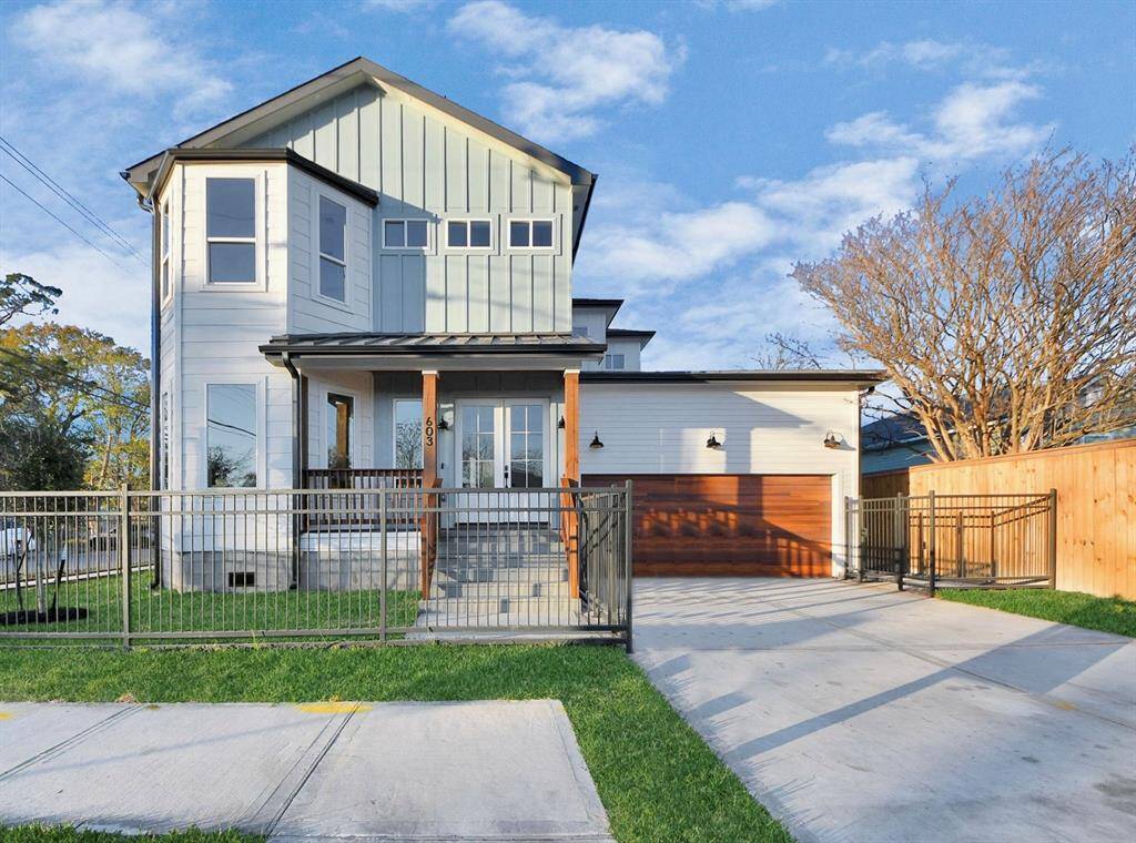 Park in your spacious driveway and enter through the CHI insulated garage, or walk through the durable metal gate surrounding the property to the front double doors.