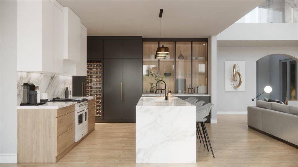 Waterfall island with gourmet kitchen appliances and glass cabinets to display your future wine collection and eccentric tableware.( These are renderings of the home)