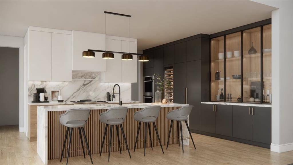 Elongated kitchen island that opens up to the living area for dining and entertainment.( These are renderings of the home)