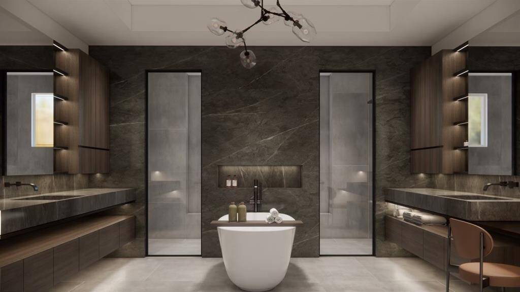 Double entry shower and vanities that sit in their own spaces. Gorgeous stand alone tub separates both sides.( These are renderings of the home)