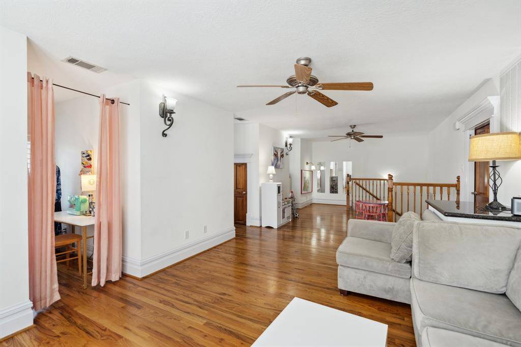 The expansive flex space continues with room for multiple zones whether for play, relaxation, or a quiet reading corner.