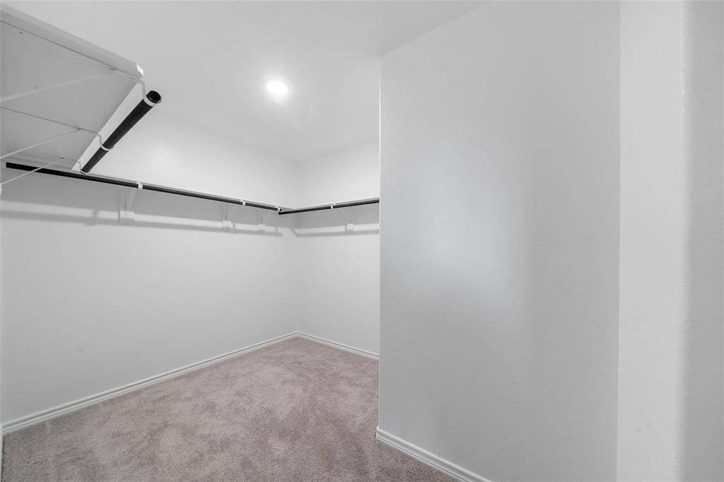 A generously sized walk-in closet—perfect for organizing it all.