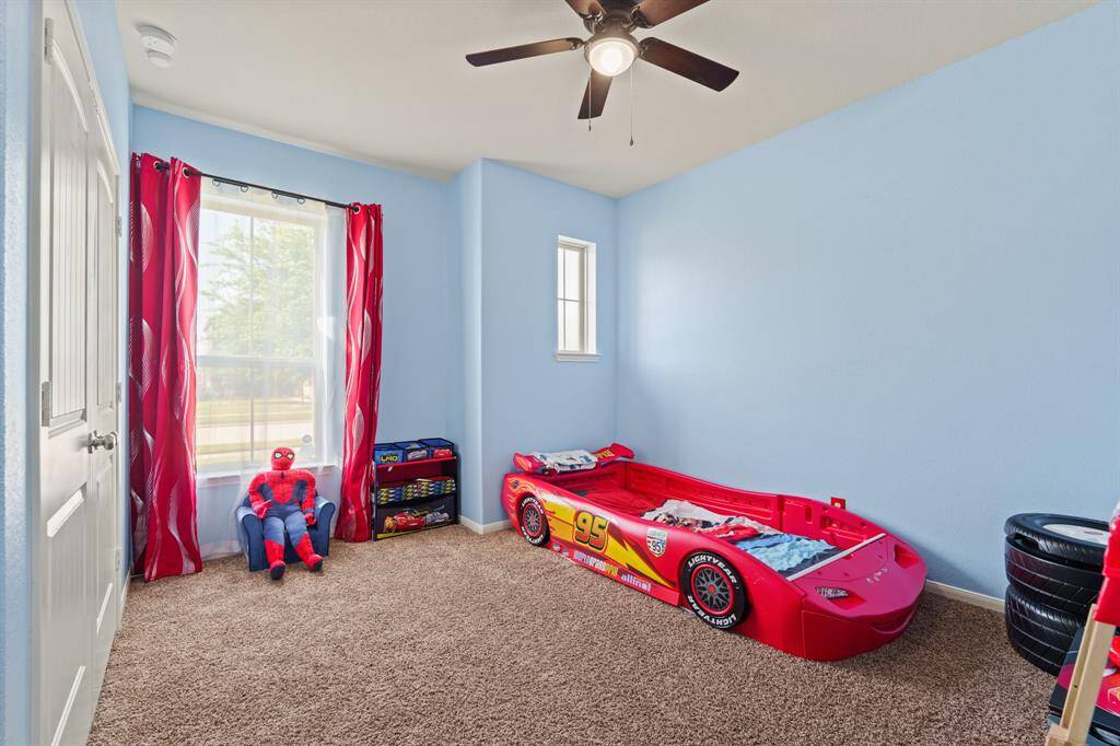 Secondary bedroom at the front of the home.