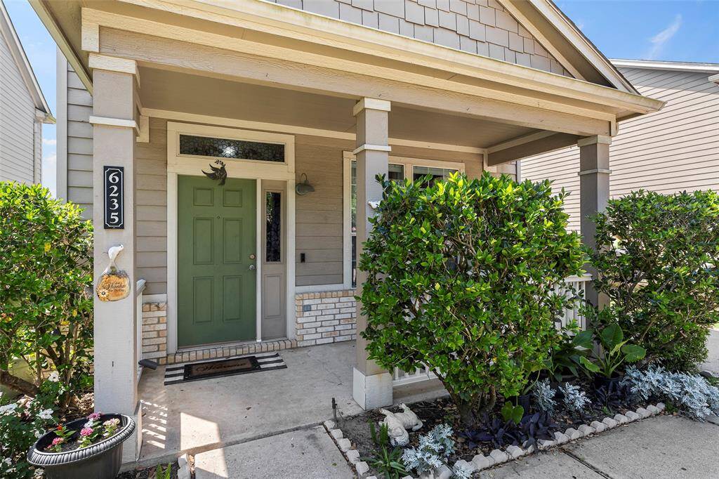 The beautiful front porch welcome you to this great house.
