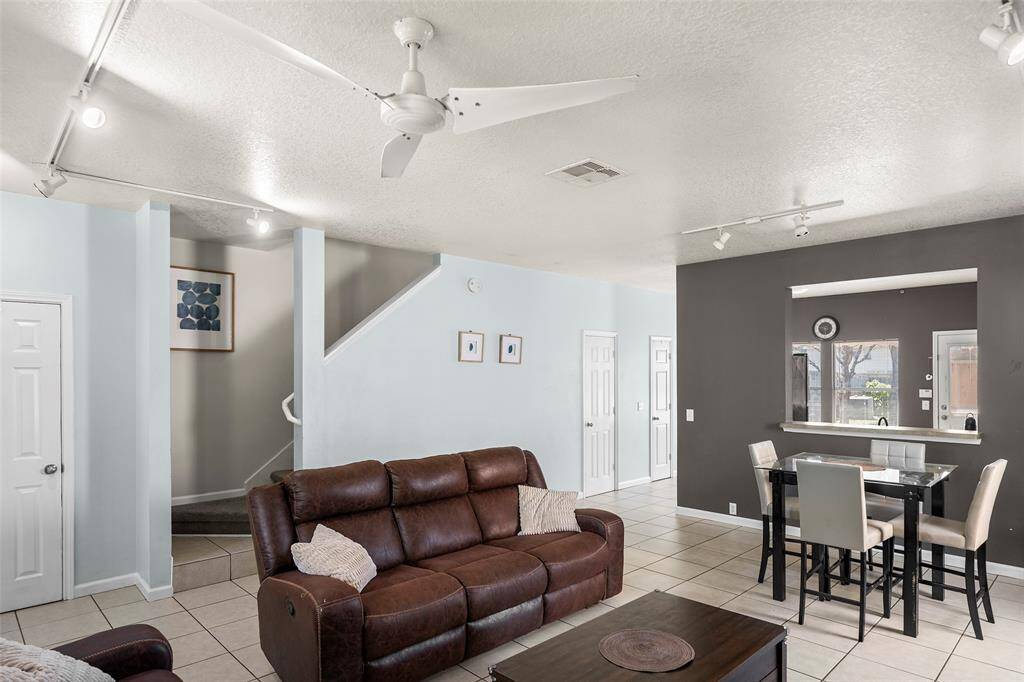 Ceiling fan and modern light fixtures.