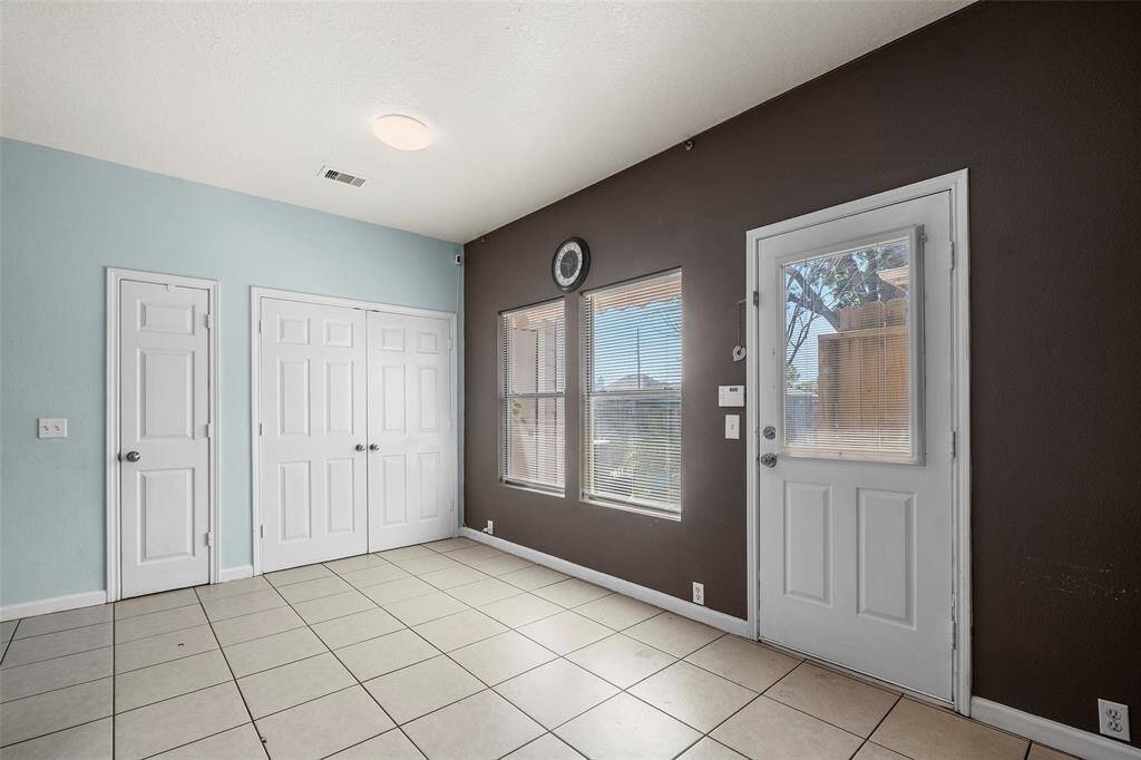 The pantry and the laundry area are behind those doors.