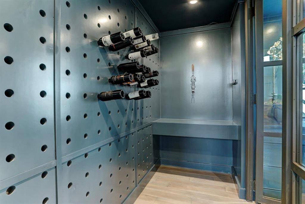 This above-ground, climate-controlled wine cellar has a tap for easy service and plentiful storage for all your favorite vintages.