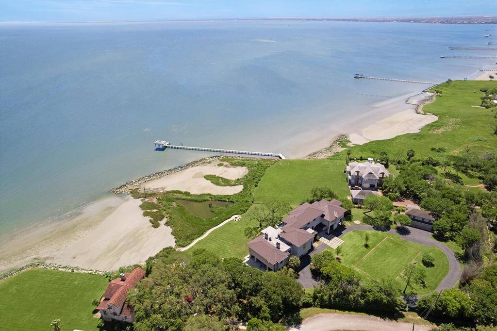This expansive property, with its own private beach, is even more impressive in person!