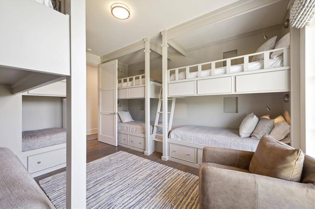 Bedroom #4 is set up as a fantastic, 8 bed bunk room! Imagine the fun memories to be created here between grandchildren, cousins, siblings, and good friends.