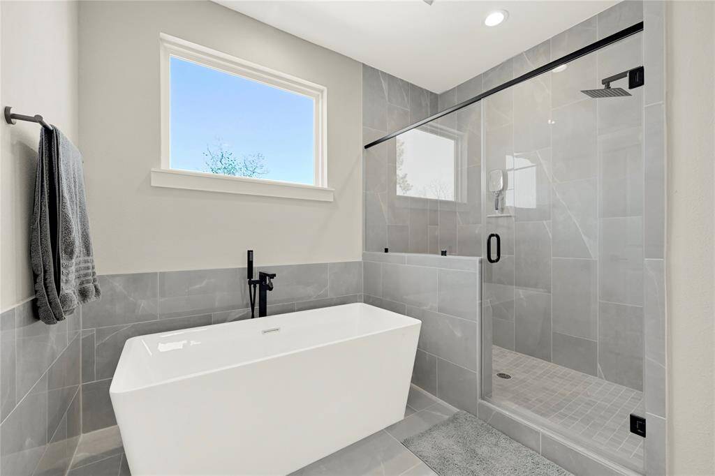 Alternate view of shower and tub