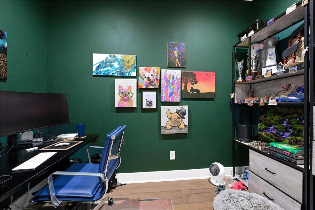 Flex space w/ barn door currently being used as an office