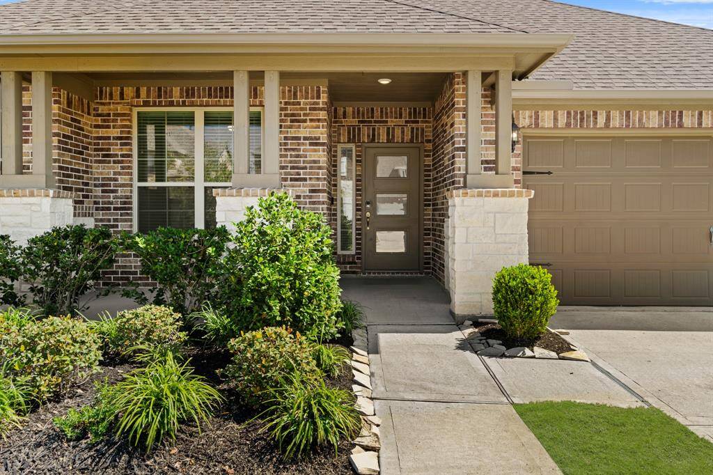 Glass front door and covered porch