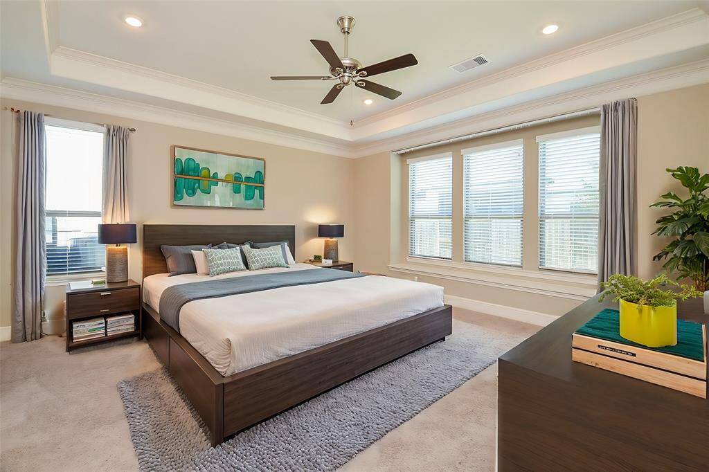 You so deserve this royal primary suite fit for a king and queen, with space and light galore! *Virtually staged*