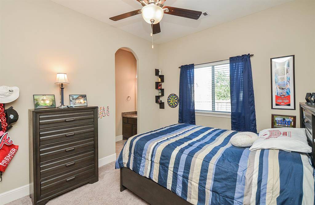 An ensuite bath is a plus in this secondary bedroom.