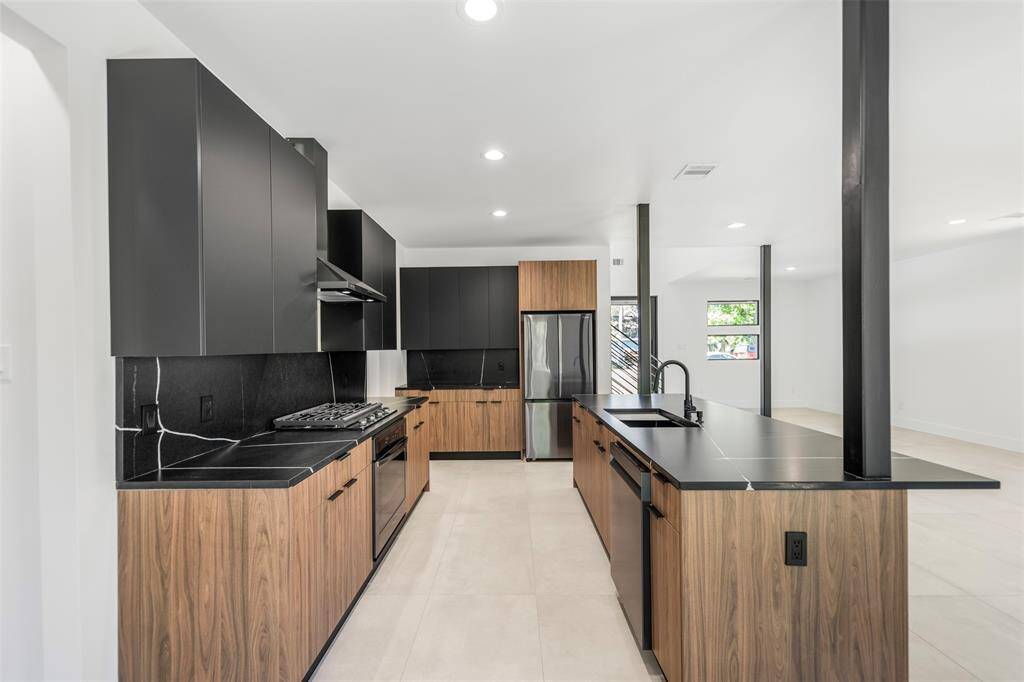 Contemporary meets practical in this thoughtfully designed kitchen with abundant counter space.