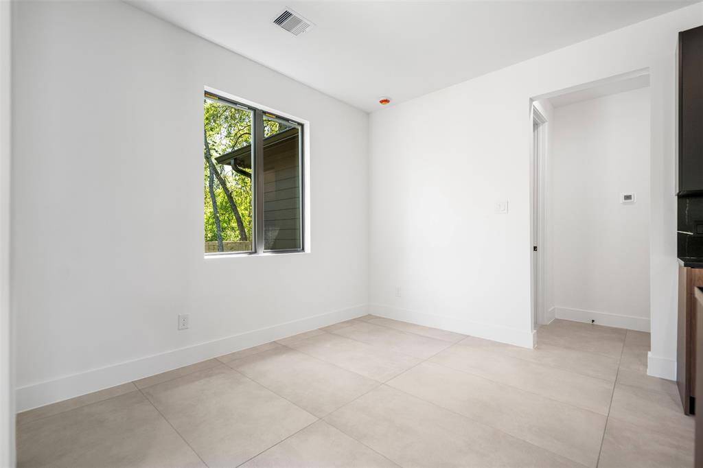 Versatile Space just off the kitchen leading into the primary