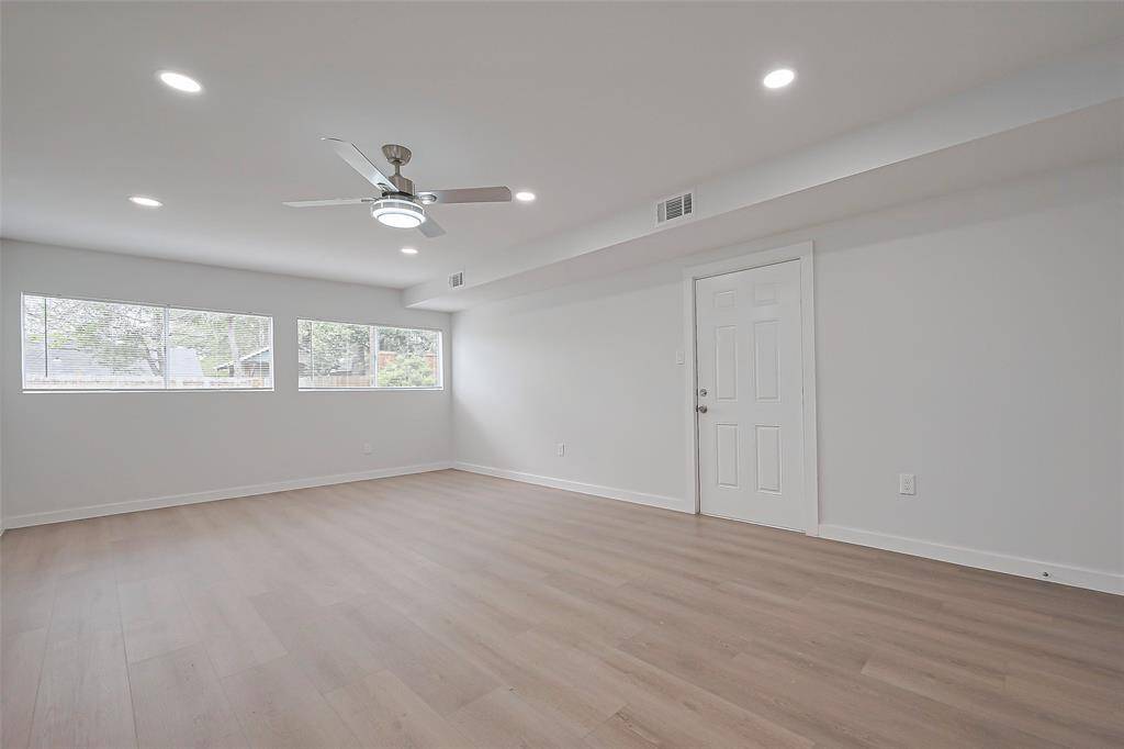 Offering a spacious yet intimate setting, this dining area can easily accommodate a large dining set, with room for extra furniture or decor.