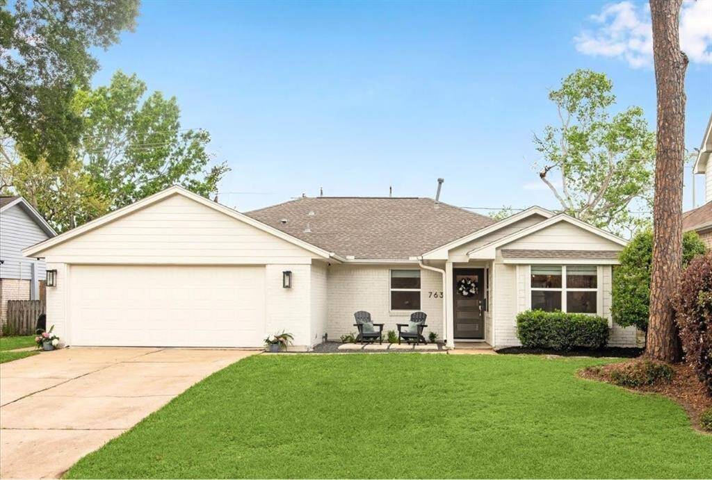 Welcome Home to this gorgeous property. Tasteful landscaping and a classic exterior with recent paint create charming curb appeal.
