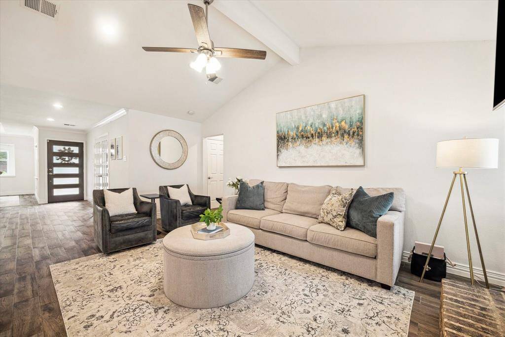 Solid flooring carries seamlessly throughout the entire home for a cohesive look.
