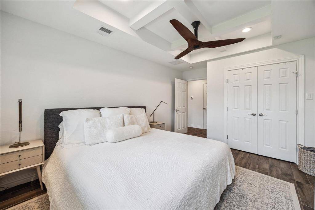 There is ample space for a king size bed, nightstands, and a dresser in this room.