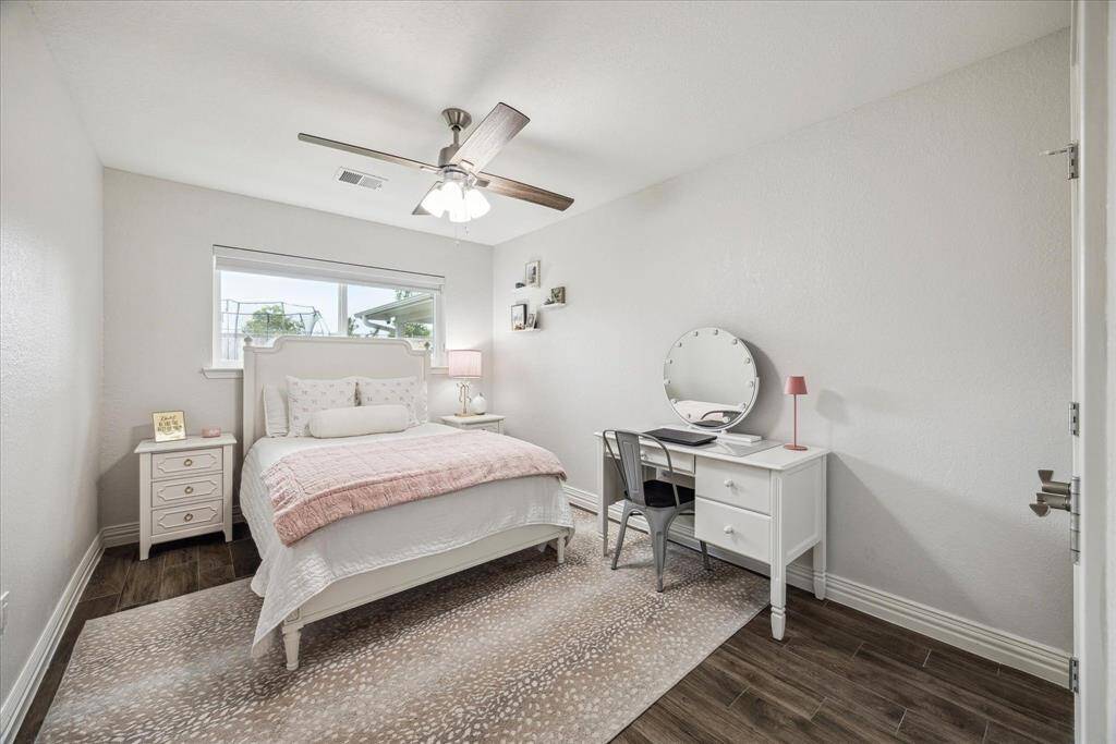 This spacious bedroom will accommodate a queen bed or two twins.