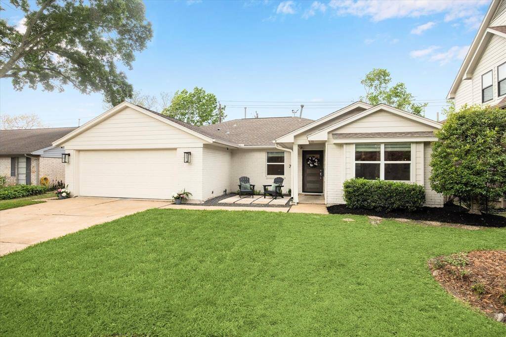 Homeowners enjoy the wide driveway which makes for convenient parking and garage access.
