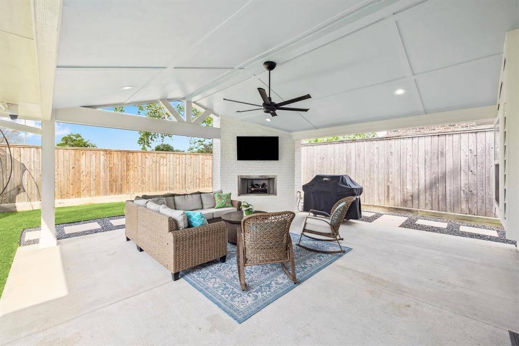 The gas fireplace grounds the space and offers a gas line for a grill and electrical for your outdoor TV.