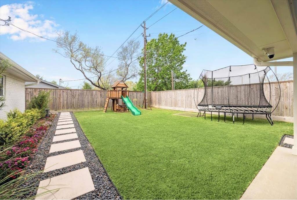 It's hard to find a home with a large patio AND a spacious green space. There's plenty of room for a pool.