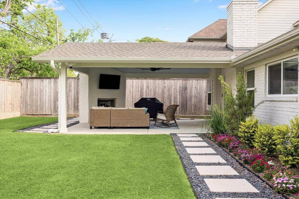No detail was neglected in this exterior remodel, from the pavers to the landscaping to the drainage. They thought of everything.