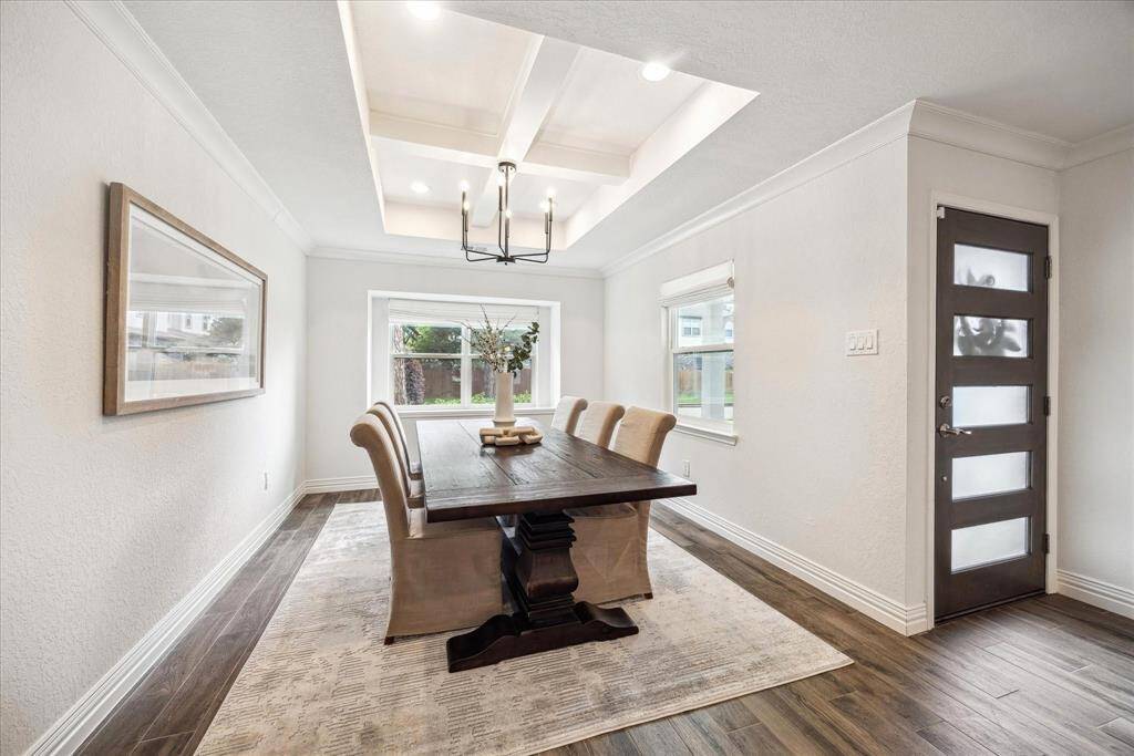 This unique floor plan offers spaces that are distinct yet open, ideal for entertaining and modern living.