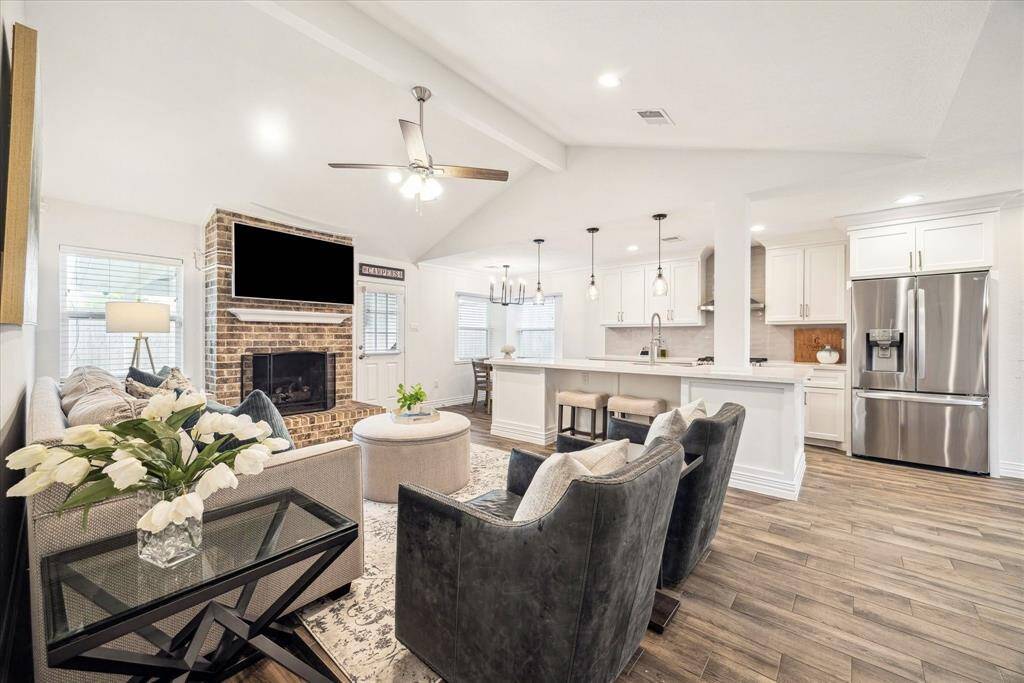 What a great space for entertaining! You'll love having a living space that is open to the kitchen and breakfast areas.