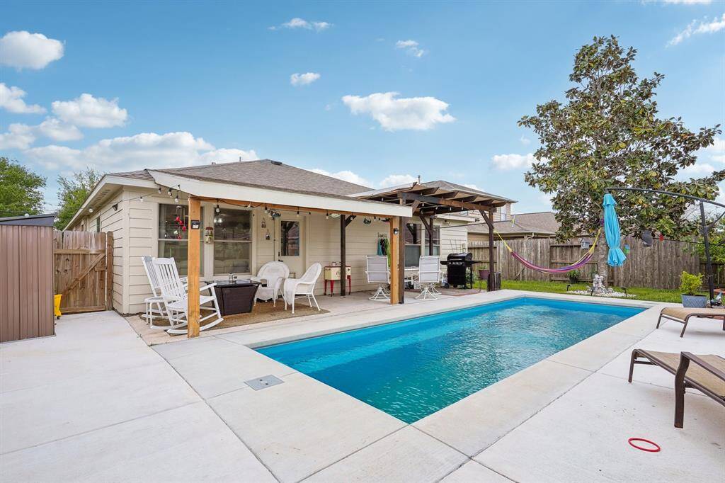 Welcome to your backyard oasis, where the owners have put their heart into the new pool, extended patio, and extended out the pool deck, making room for the chaise lounge chairs and minimizing maintenance for lawn care.
