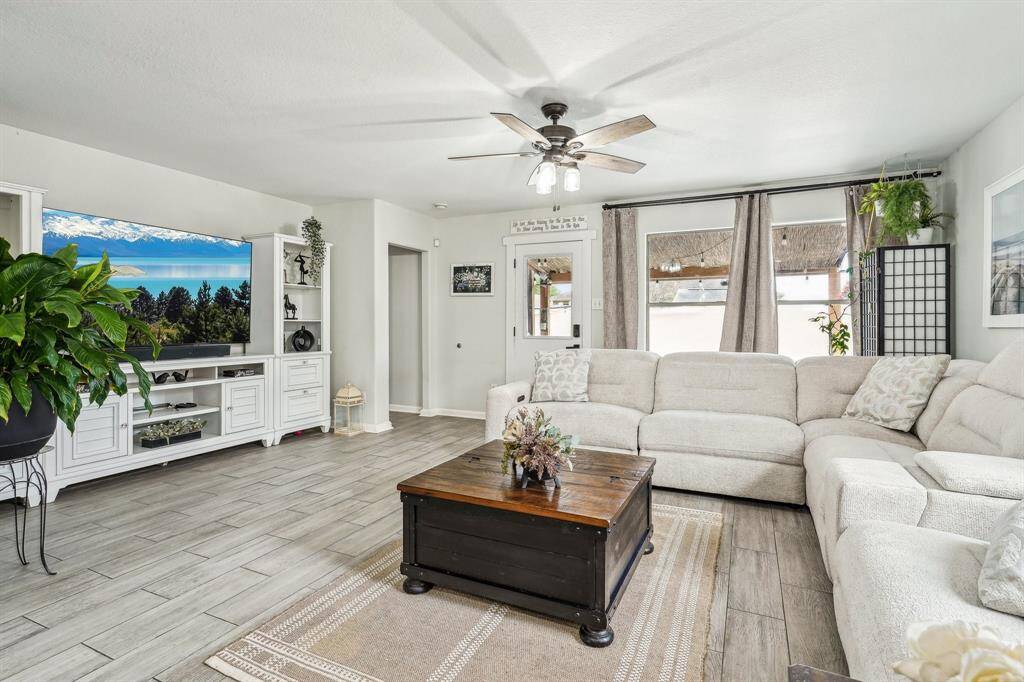 The home has an open floor plan with an adjacent spacious family room.